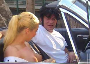 Inviting blonde Hollie Stevens in elegant white apparel bares their way hawt breasts and then gives stunning blow job in cabriolet. Then elegant lady pats their way legs and acquires their way slit tongue fucked